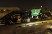 La Saoudienne Samar Al-Moqren conduit sa voiture dans les rues de Ryad le 24 juin 2018, à minuit, au moment où est levée l'interdiction aux femmes de conduire