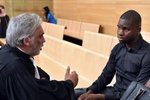 Odsonne Edouard avec son avocat Pierre Le bonjour avant une audition le 13 juin 2017 au Palais de justice de Toulouse