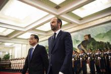 Le premier ministre Édouard Philippe avec son homologue chinois Li Keqiang à Pékin, le 25 juin 2018