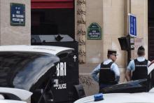 Gendarmes et hommes de la BRI interviennent rue des Petites écuries à Paris le 12 juin 2018