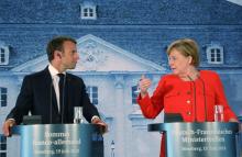 "Nous nous engageons pour un budget de l'euro", a déclaré Angela Merkel (d) lors d'une conférence de presse le 19 juin à Berlin avec Emmanuel Macron