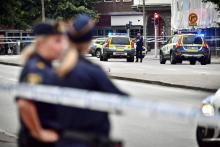 Cordon de police après une fusillade dans le centre de Malmö, le 18 juin 2018 en Suède