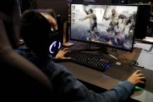 Un jeune gamer lors de la semaine des Jeux vidéo à Paris, le 5 novembre 2017