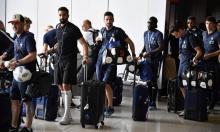 Les joueurs de l'équipe de France, sacrés champions du monde la veille, à l'aéroport de Moscou le 16 juillet 2018 avant leur départ pour la France