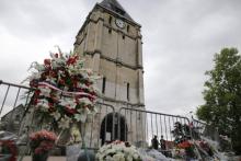 Le prêtre Hamel, venait d'achever sa messe matinale dans son église de cette banlieue ouvrière de Rouen quand il avait été tué de deux coups de couteaux à la gorge
