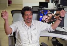 Le photographe de l'AFP Yuri Cortez, participant involontaire à la célébration par les joueurs croates du but de la victoire en demi-finale de la coupe du monde, lors de son interview à l'AFP le 12 ju