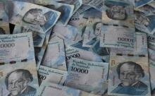 La suppression de cinq zéros à la monnaie vénézuélienne devrait éviter dans l'immédiat l'effondrement du système de paiement