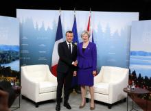 Emmanuel Macron et Theresa May au sommet du G7 à La Malbaie au Québec, le 8 juin 2018