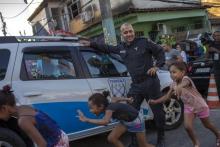 L'acteur Marcos Palmeira sur le tournage d'un film sur la "pacification" des favelas, le 17 juillet 2018 dans la favela de Tavares Bastos à Rio