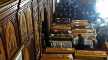 Les cercueils de victimes d'un attentat anti-chrétien dans une église copte du Caire pendant leurs funérailles dans le quartier de Nasr City, le 12 décembre 2016