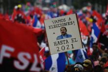 Des partisans du président du Nicaragua Daniel Ortega défilent à Managua, le 7 juillet 2018