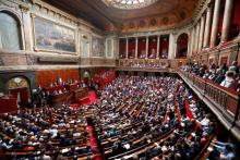 Le président français Emmanuel Macron s'adresse aux parlementaires de l'Assemblée nationale et du Sénat, réunis en Congrès à Versailles, le 9 juillet 2018
