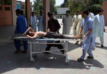 Un jeune blessé dans l'assaut d'un site du département de l'éducation à Jalalabad (est) le 11 juillet 2018