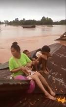 Photo tirée d'une vidéo de la chaîne ABC Laos montrant une vue aérienne des inondations provoquées par l'effondrement d'un barrage dans la province d'Attapeu (sud-est du Laos)