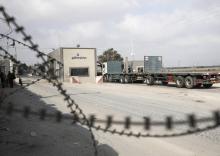Des camions au terminal de Kerem Shalom, point de passage de marchandises entre Israël et la bande de Gaza, le 17 juillet 2018 à Rafah