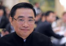 Le patron du conglomérat chinois HNA, le 23 octobre 2012