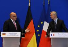 Le ministre français de l'Economie Bruno Le Maire (D) et son homologue allemand, Peter Altmaier (G), à Paris, le 11 juillet 2018