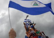 Des manifestants nicaraguayens participent à une marche nationale "Unis nous sommes un volcan" à Managua au Nicaragua, le 12 juillet 2018