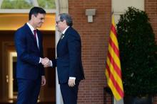 De gauche à droite, le roi d'Espagne Felipe VI, le premier ministre espagnol Pedro Sanchez et le président catalan Quim Torra à Tarragona le 22 juin 2018