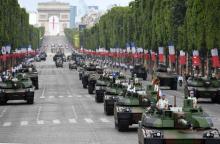 La France rétrograde en 6ème place derrière l'Inde pour les dépenses militaires Ci-contre le défilé militaire sur les Champs-Elysées du 14 juillet 2017