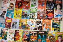 Des numéros du magazine Astrapi exposés au siège de la revue, le 10 juillet 2018 à Montrouge, près de Paris