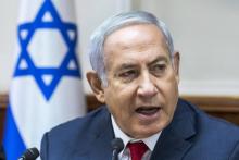Le Premier ministre israélien Benjamin Netanyahu réclamant un cessez-le-feu "total" du Hamas à Gaza, lors d'un conseil des ministres à Jérusalem, le 12 août 2018