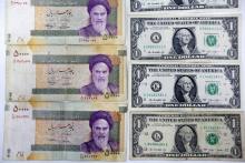Le rial, monnaie iranienne, a perdu plus de la moitié de sa valeur face au dollar américain depuis près d'un an