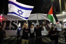 Des Arabes israéliens manifestent contre une loi controversée définissant Israël comme "l'Etat-nation du peuple juif", le 11 août 2018 à Tel-Aviv