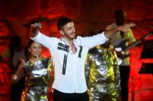 Le chanteur marocain Saad Lamjarred se produit sur scène le 30 juillet 2016 lors du festival de Carthage en Tunisie