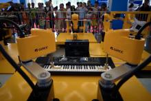 Un robot capable de jouer du piano, présenté au 4e congrès mondial des robots à Pékin, le 15 août 2018