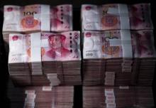 BLa chute du yuan se révèle un atout à double tranchant pour la Chine dans la guerre commerciale qui l'oppose aux Etats-Unis