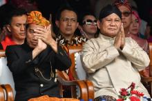 Le président indonésien Joko Widodo (à gauche sur la photo), candidat à sa succession, le 23 septembre 2018 à Jakarta.