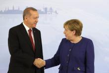 Le président turc Recep Tayyip Erdogan et la chancelière allemande Angela Merkel lors d'une conférence de presse à Berlin, le 04 février 2014