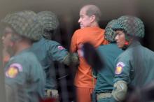 La cinéaste australien James Ricketson arrive au tribunal de Phnom Penh pour son procès le 16 août 2018