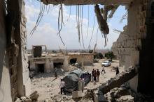 Les destructions après les bombardements du régime syrien sur le village de Hbit dans le sud de la province d'Idleb, le 9 septembre 2018
