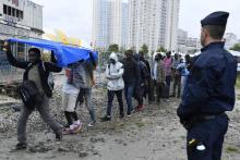 Evacuation de migrants Porte de la Chapelle le 18 août 2018