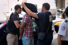 Un des assassins présumés d'Hélène Pastor et de son chauffeur à son arrivée au tribunal de Marseille, le 27 juin 2014
