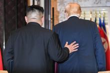 Le dirigeant nord-coréen Kim Jong Un et le président américain Donald Trump lors de leur rencontre à Singapour le 12 juin 2018