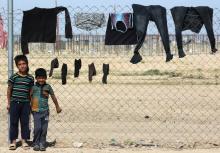 Des enfants irakiens dans un camp de déplacés près de Khalidiya dans la province occidentale d'Al-Anbar, le 24 avril 2018