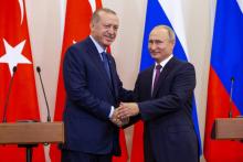 Le président russe Vladimir Poutine (g) et son homologue turc Recep Tayyip Erdogan, le 7 septembre 2018 à Téhéran