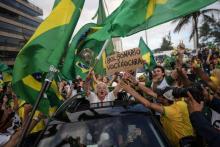 Simpatizantes del presidente electo de Brasil, Jair Bolsonaro, celebran el 28 de octubre de 2018 en las calles de Rio de Janeiro