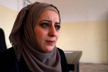 Amani, mère de trois enfants, parle de son mari Abdel-Ilah arrêté par les jihadistes de l'EI, le 14 octobre 2018 à Raqa, en Syrie