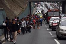 Des Honduriens déterminés à atteindre les Etats-Unis, malgré les menaces de Donald Trump de fermer la frontière, le 18 octobre 2018 au Guatemala