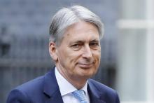Le chancelier de l'Echiquier britannique, Philip Hammond arrive à Downing Street le 24 octobre 2018 à Londres