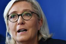 Marine Le Pen (RN), photographiée lors d'une conférence de presse en Italie le 8 octobre 2018.