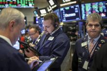 Des tradeurs au New York Stock Exchange, le 25 octobre 2018