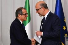 Le ministre italien de l'Economie, Giovanni Tria, et le commissaire européen aux Affaires économiques, Pierre Moscovici, lors d'une conférence de presse à Rome, le 18 octobre 2018