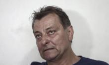 L'ancien militant d'extrême gauche Cesare Battisti, condamné pour meurtre en 1993 par contumace en Italie, lors d'un entretien avec l'AFP à Cananeia, dans l'Etat de Sao Paulo au Brésil, le 20 octobre 