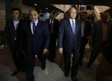 Le Premier ministre désigné, Adel Abdel Mahdi (G), et nouveau président irakien Barham Saleh (C), le 2 octobre 2018 à Bagdad