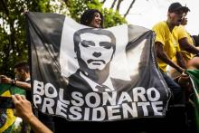 Des supporteurs du candidat d'extrême droite à la présidentielle Jair Bolsonaro lors d'un rassemblement à Rio de Janeiro, le 29 septembre 2018 au Brésil